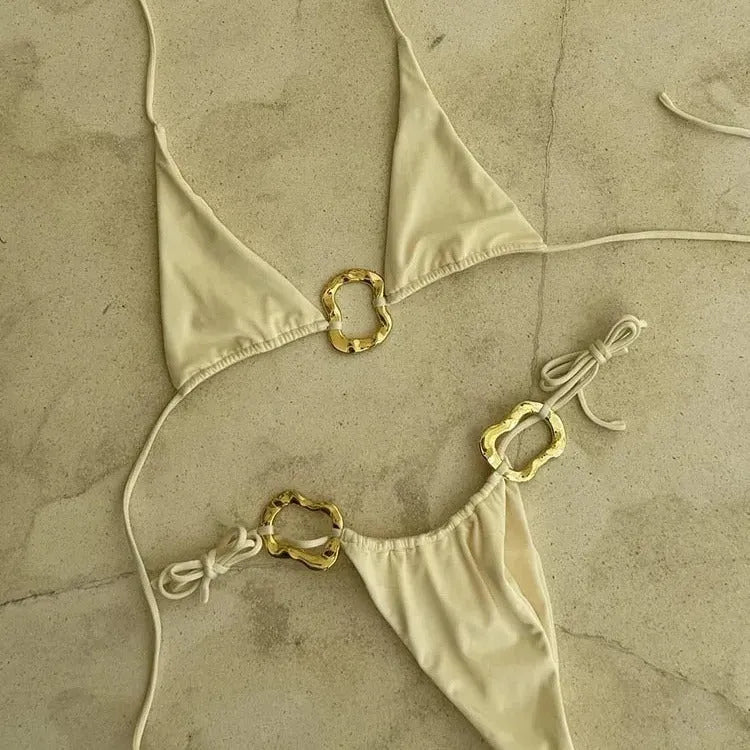 Women's lace-up front bikini set with halter neckline and low-waist briefs in solid colour