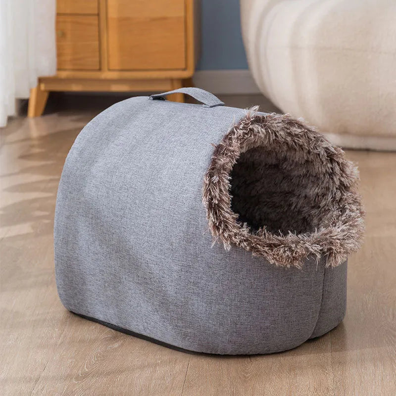 Grey fleece-lined closed cat sleeping bag bed shown next to a coffee-coloured one.