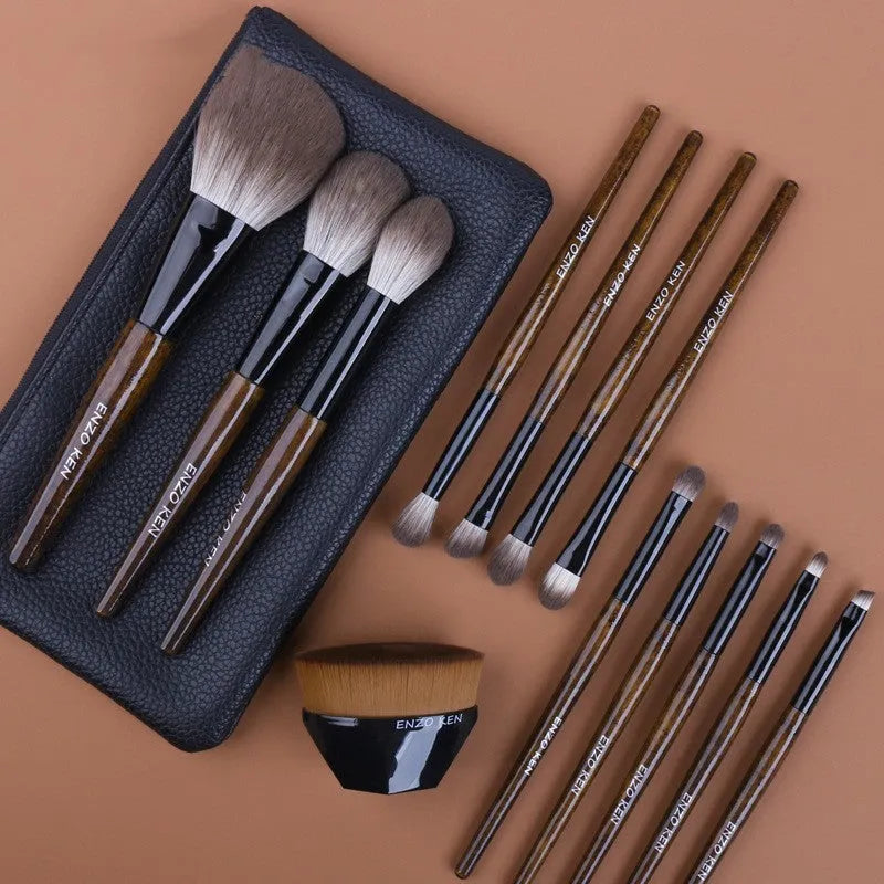 12-piece wooden handle makeup brush set with a powder brush in a grey PU pouch
