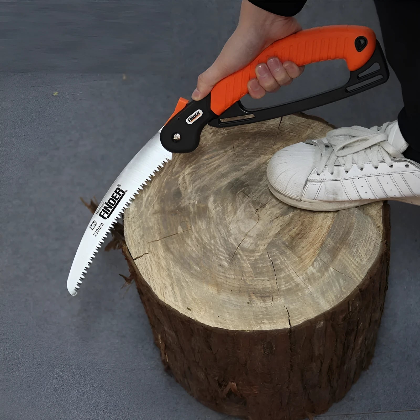 A folding garden hand saw with a black TPR grip and a 230mm steel blade, shown both open and closed.