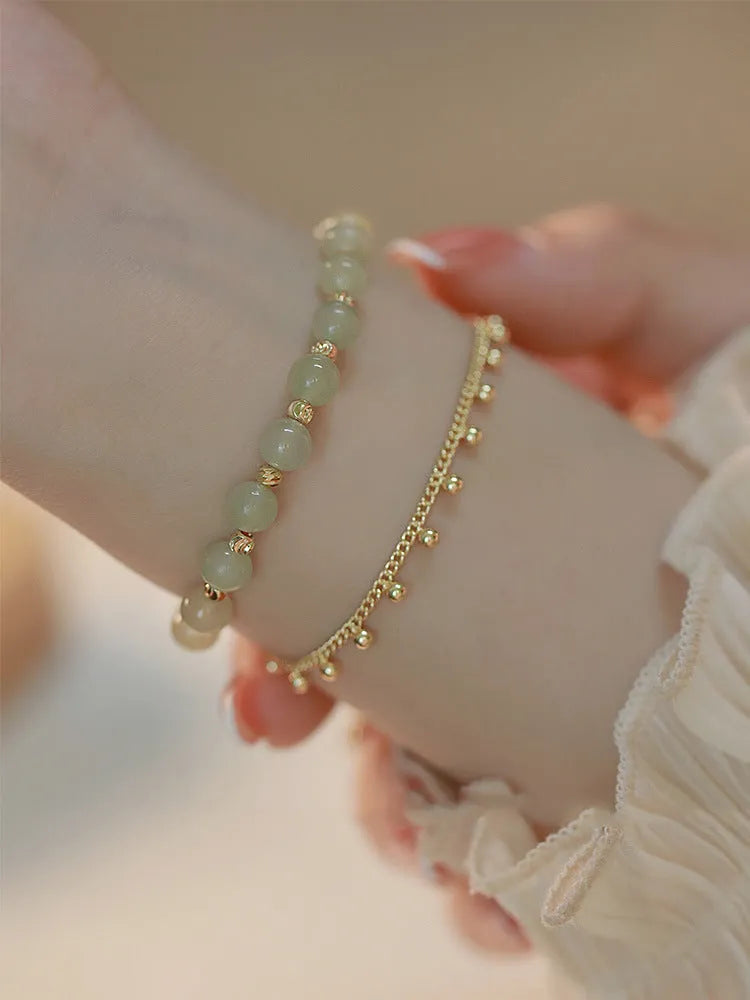 Escape Princess Natural Hetian Jade Bracelet showing beaded design with Princess Running elements