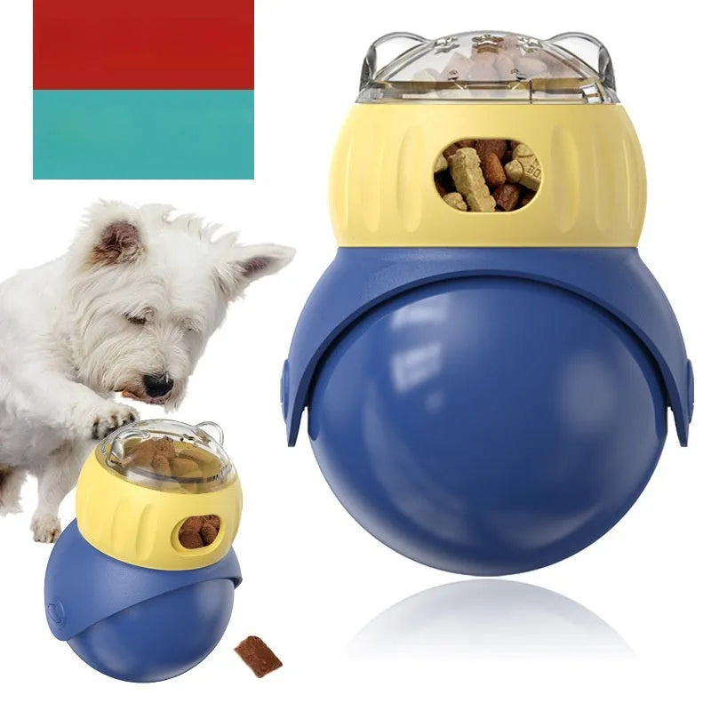 Yellow and blue plastic owl-shaped tumbler puzzle feeder for cats on a plain background.