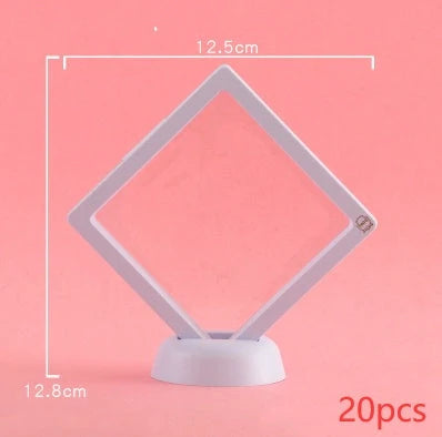 3D floating jewelry display stand showcasing earrings and coins in mid-air