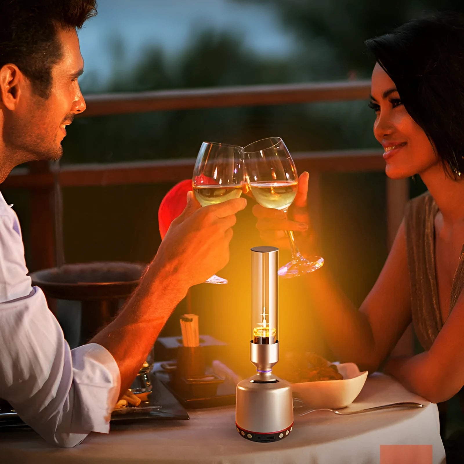 White silver cylindrical Bluetooth speaker and night light unit on a table.