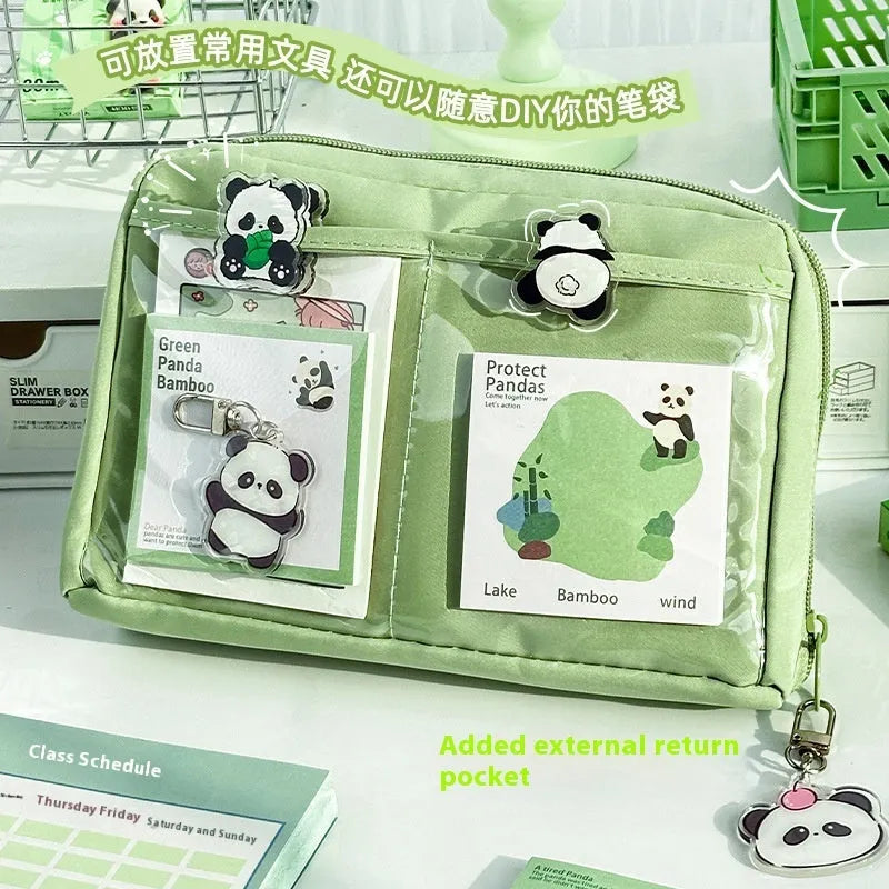 Green canvas 12-layer panda pencil case with zip closure, shown open to reveal compartments.