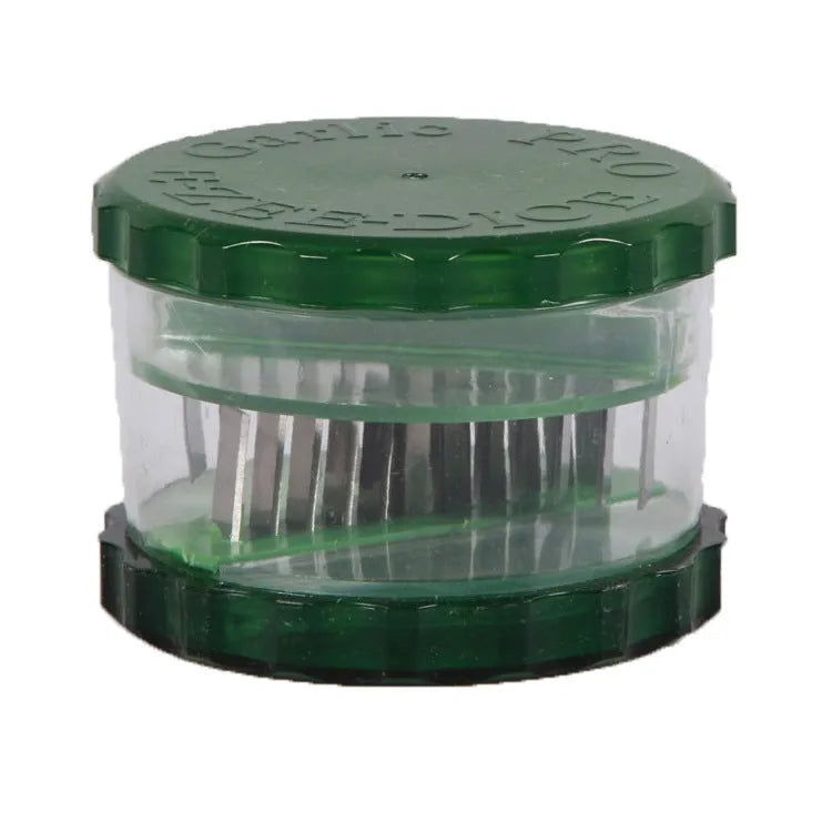 Green transparent PP plastic garlic peeler kitchen gadget measuring 8.5cm.