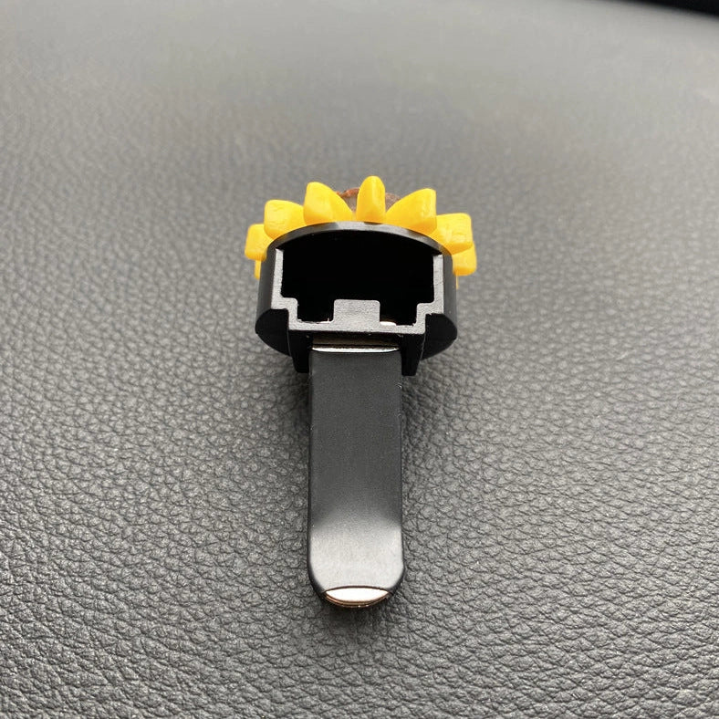 Yellow sunflower car vent perfume clip measuring 8cm with secure mounting clip for air freshening