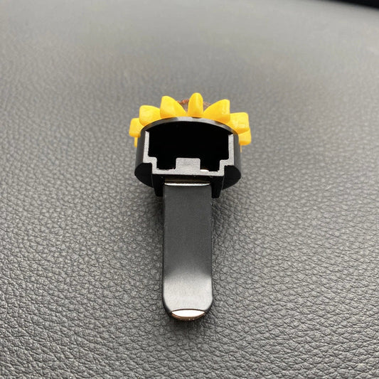 Yellow sunflower car vent perfume clip measuring 8cm with secure mounting clip for air freshening