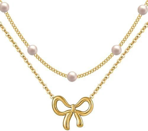 Double layer pearl choker with bow pendant in gold and silver options