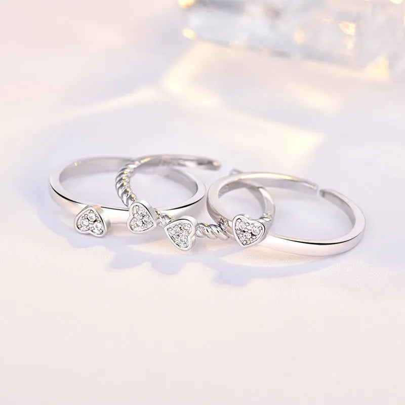 Four-leaf clover adjustable ring set for women with spinning top and zircon stones in white gold finish