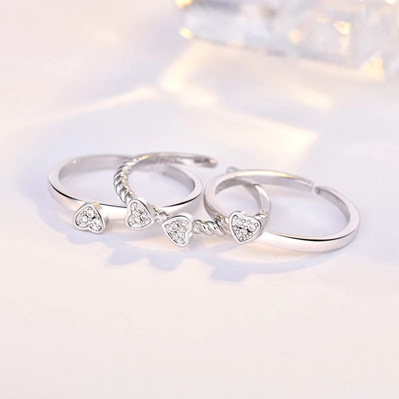 Adjustable four-leaf clover ring with spinning top design and zircon accents