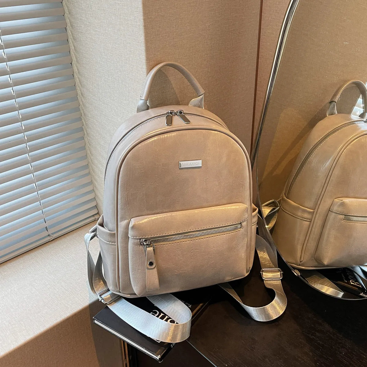 Ladies travel backpack in urban simplicity style, soft PU material, waterproof, with sandwich pocket