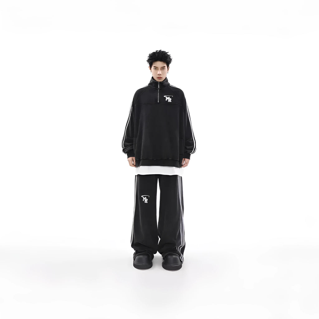 Black Hong Kong style stand collar couple sweater with long sleeves and a coat-style design.