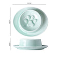 Ceramic slow feed pet bowl in green with internal ridges and neck protection design.