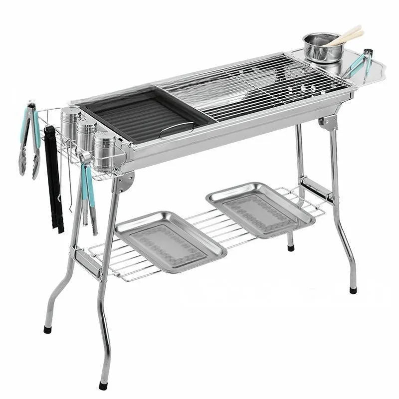 Large stainless steel turnover barbecue oven with charcoal grill and cooking accessories