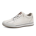 Men's white breathable shoes with round toe and flat 6CM heel on a plain background