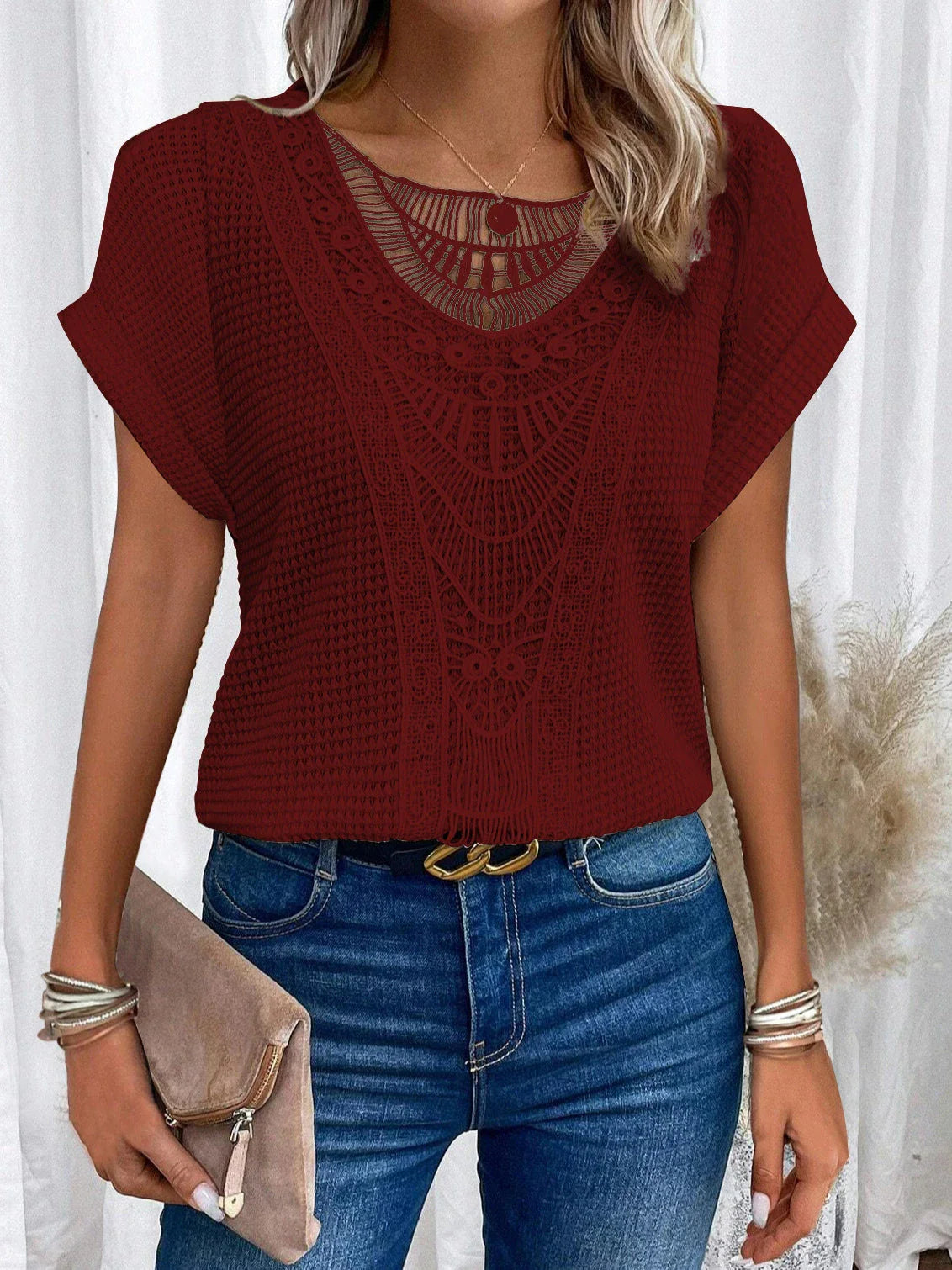 A stylish, cutout short-sleeve tee in various vibrant colors for women's casual summer fashion