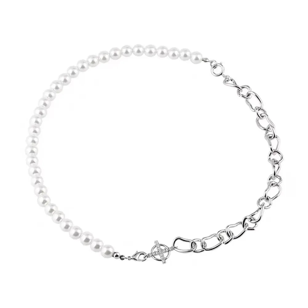 White geometric asymmetric acrylic pendant necklace on a twisted chain.