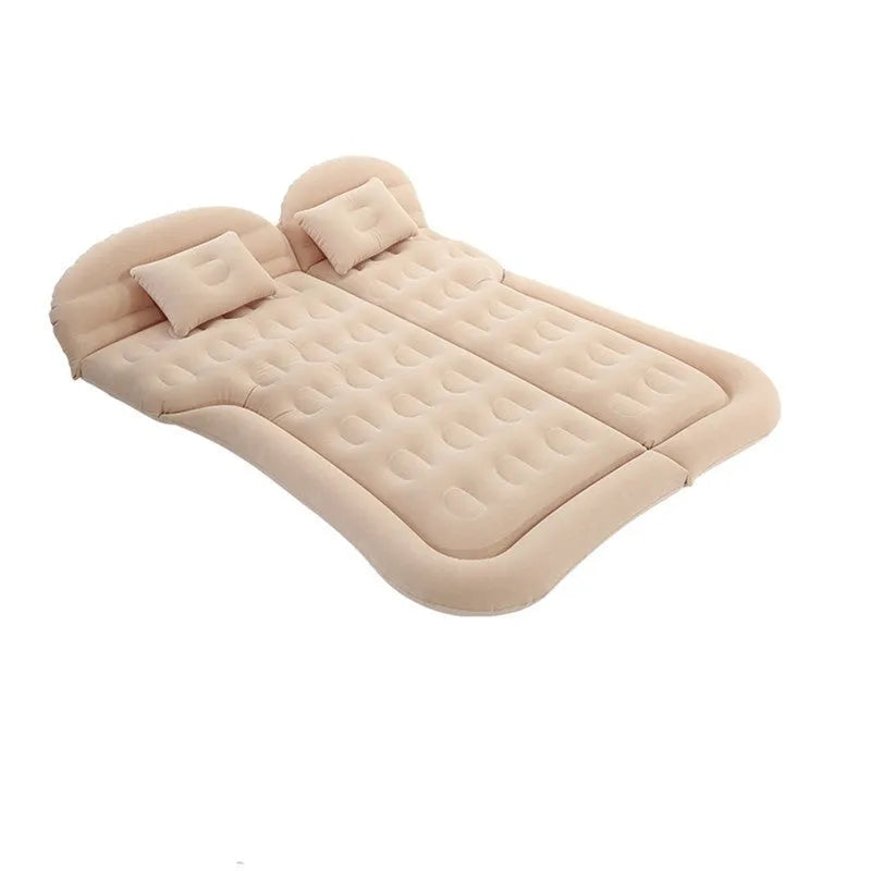 Beige SUV inflatable bed with flocking surface and car motor pump on vehicle floor