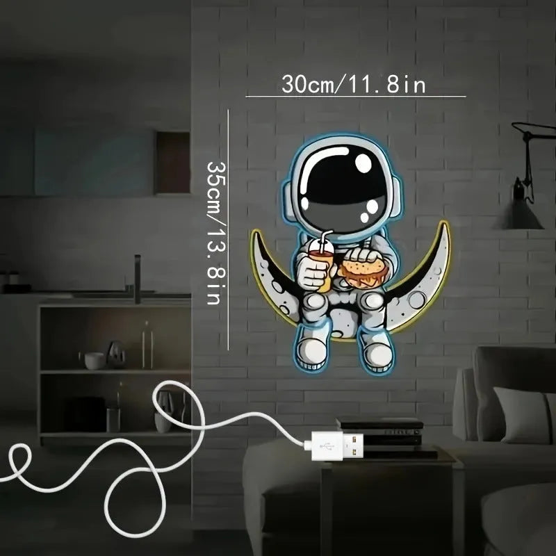 Wall mounted astronaut LED neon light with moon design and lemon yellow accents measuring 30x35cm