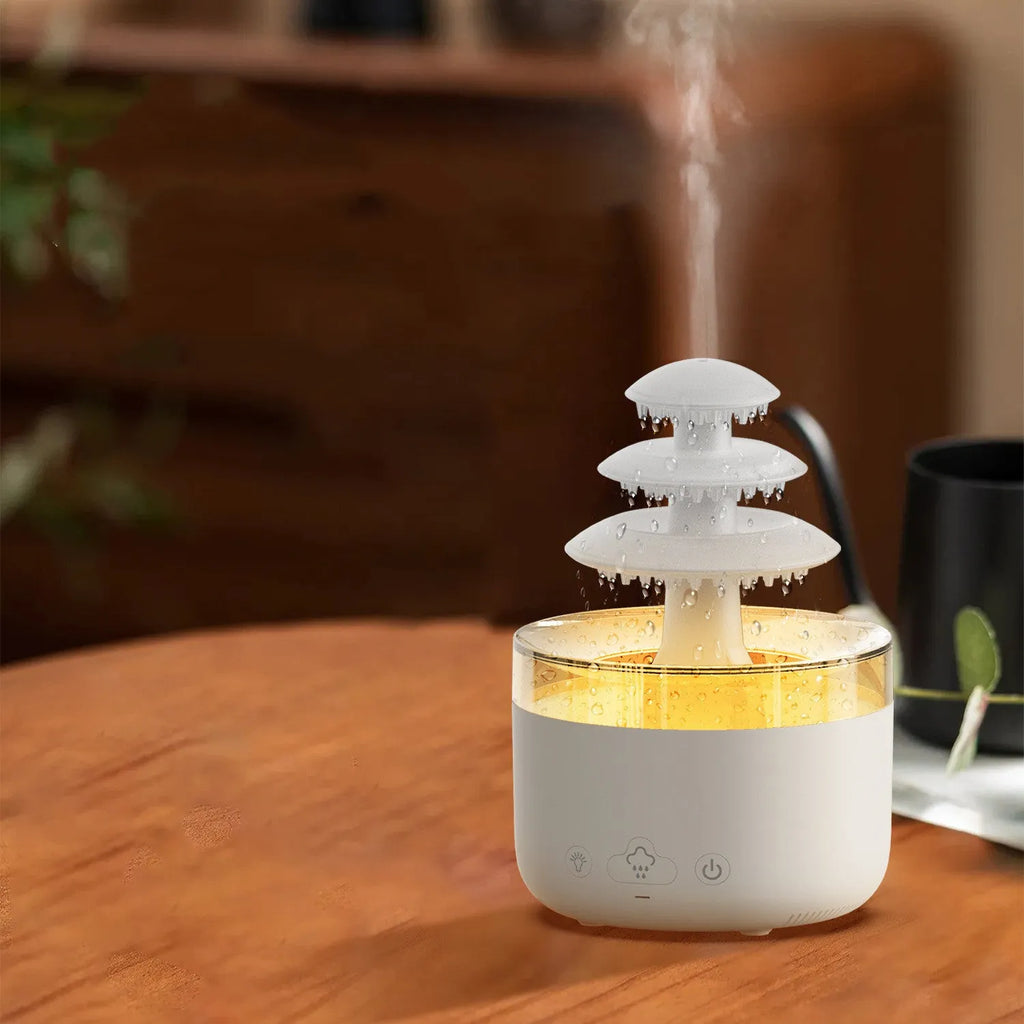 White cloud-shaped humidifier with colourful LED lights and mist output
