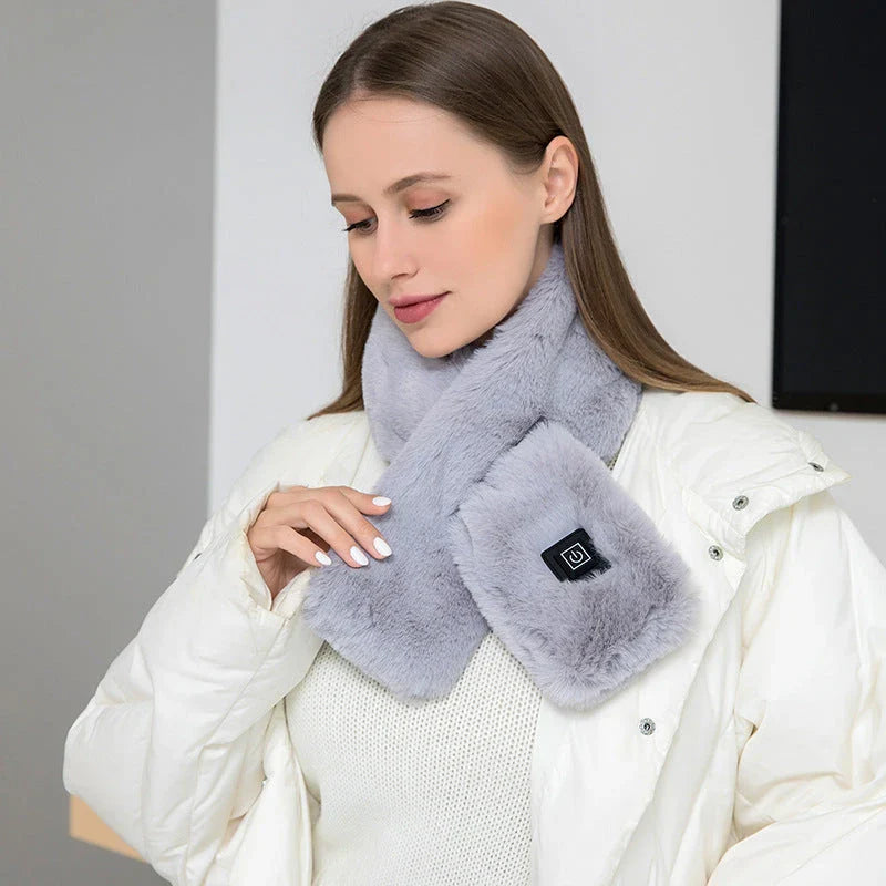 USB-powered heated scarf with 3 adjustable temperature settings, made of soft, lightweight, and washable fabric for cozy comfort.