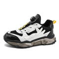 Men's black casual dad shoes with rotating button fastening and mesh upper