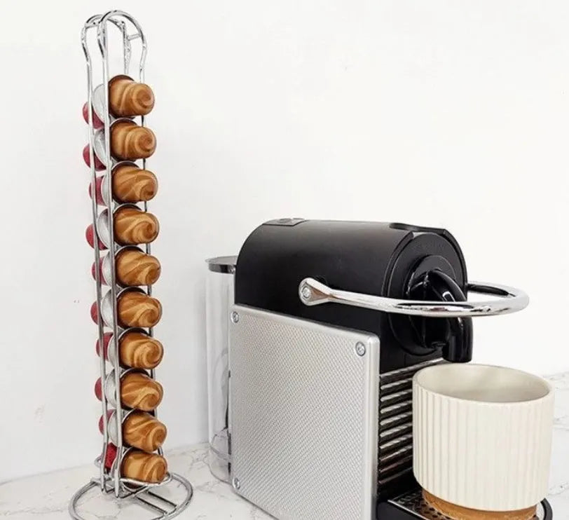 Black wrought iron coffee capsule storage rack holding 20 pods