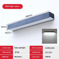 Black solar-powered outdoor wall lamp with IP65 waterproof rating for garden and patio lighting