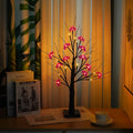 60cm tall LED birch tree night light with 24 warm white lights and detailed plastic bark texture