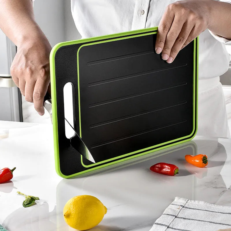 Grey square aluminium cutting board with grinding teeth and integrated knife sharpener