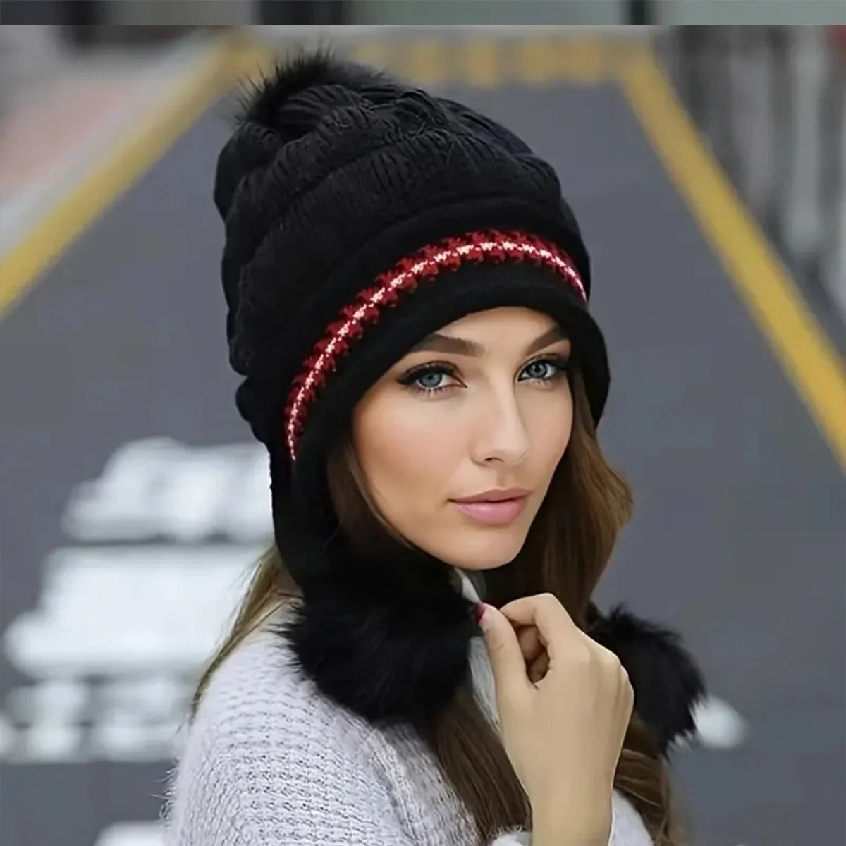 Knit fleece beanie with ear flaps and pompom in various colours for winter warmth