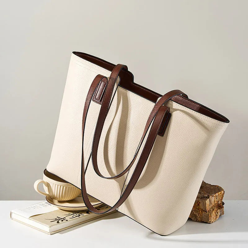Women's genuine leather crossbody bag in horizontal square design with multiple internal compartments