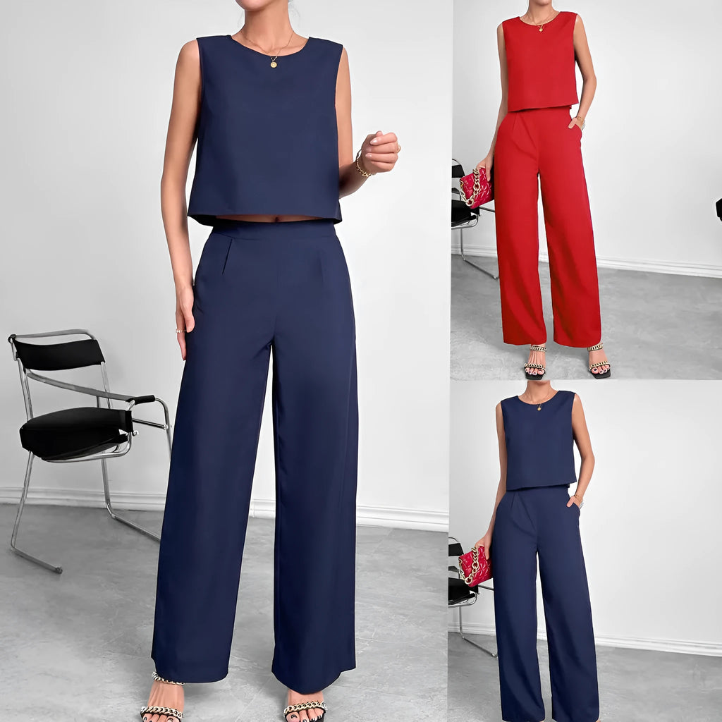 Red polyester two-piece set showing sleeveless top and wide leg trousers on Asian size mannequin