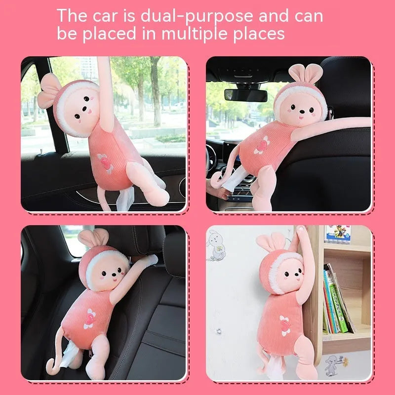 Plush fabric car seat back tissue box holder with animal character design mounted behind car headrest