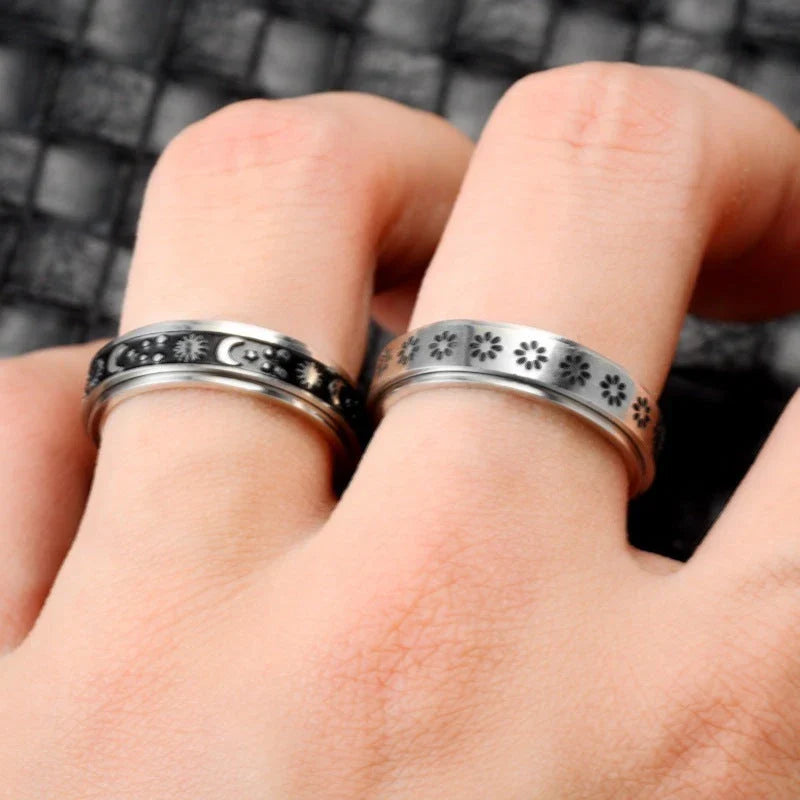 Stainless steel rotatable spinner ring with moon and stars design for stress relief