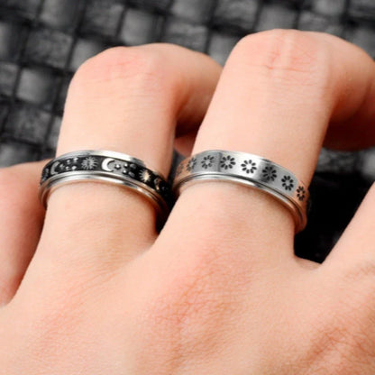 Stainless steel spinner ring with moon and stars design for anxiety relief