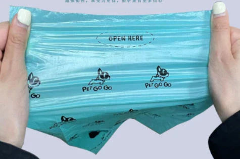 Portable dog poop scooper with claw mechanism and built-in bag dispenser for easy pet waste cleanup