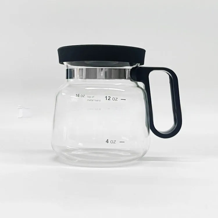 Transparent borosilicate glass coffee maker with a black silicone cover for pour-over brewing.