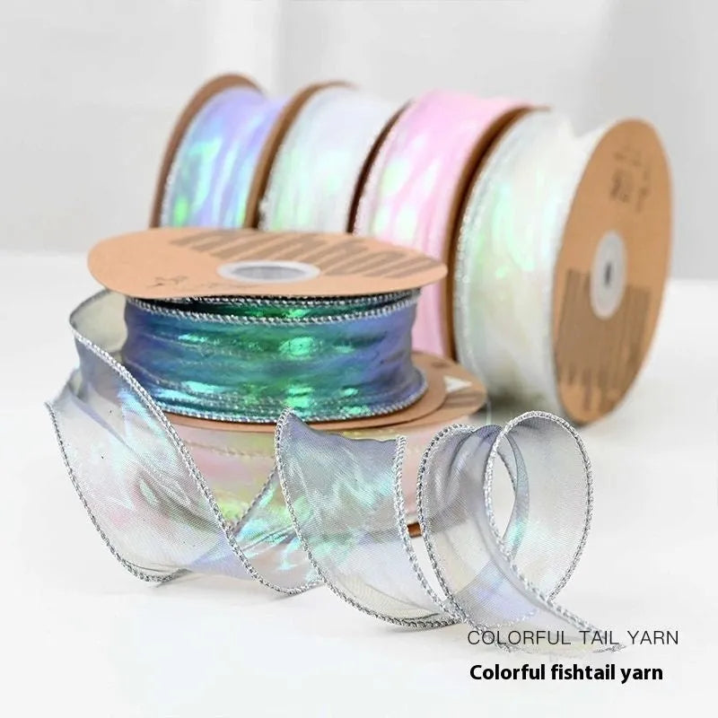Roll of fishtail yarn floral design mesh craft ribbon in various colours, showing 4cm width.