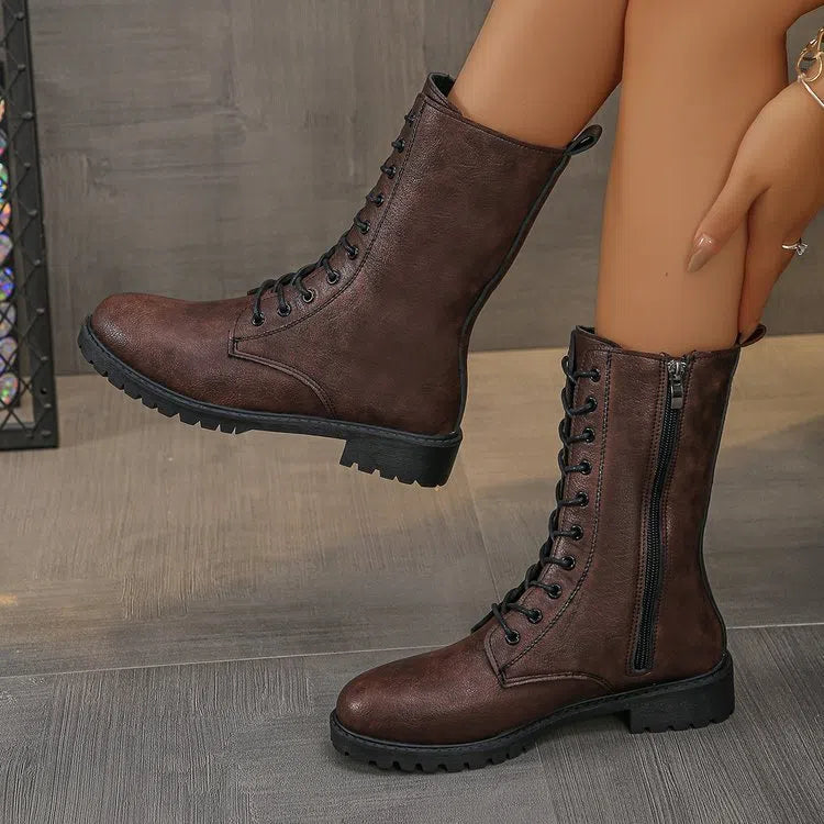 Women's flat mid-calf lace-up boots in brown with artificial PU upper and hollow design detail