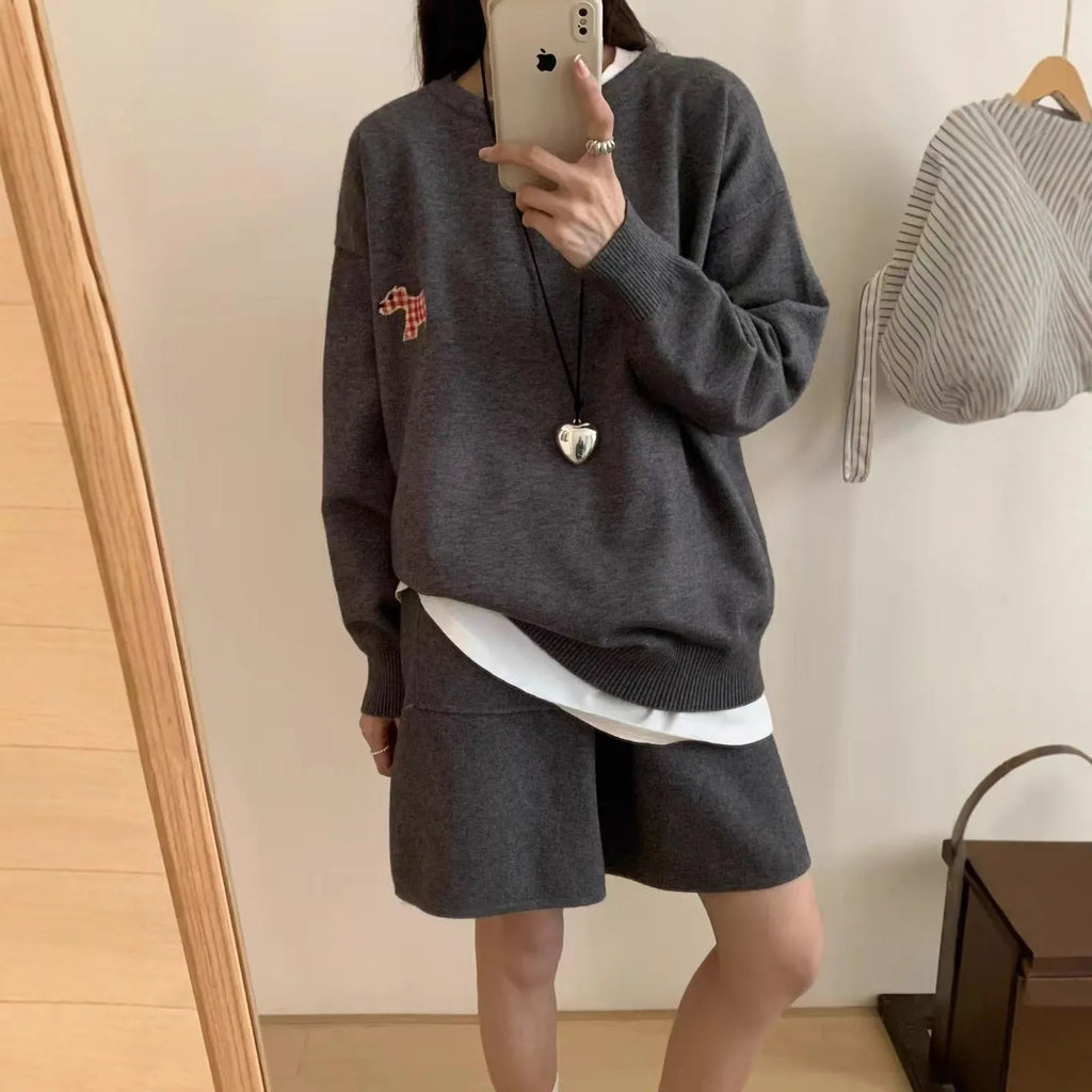 Women's knitted sweater and shorts suit in imitation cashmere with animal embroidery, shown in milk blue.