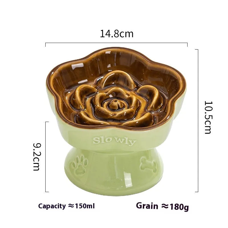 Black ceramic pet bowl with a high foot neck protector on a flat surface.