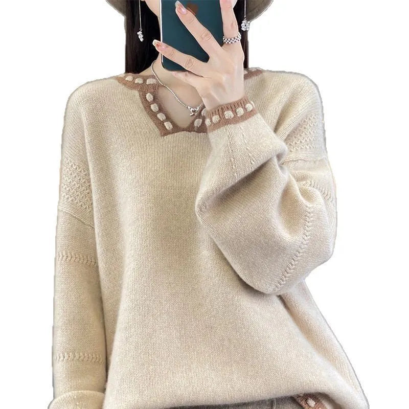 Women's camel V-neck long sleeve viscose pullover sweater on a hanger.
