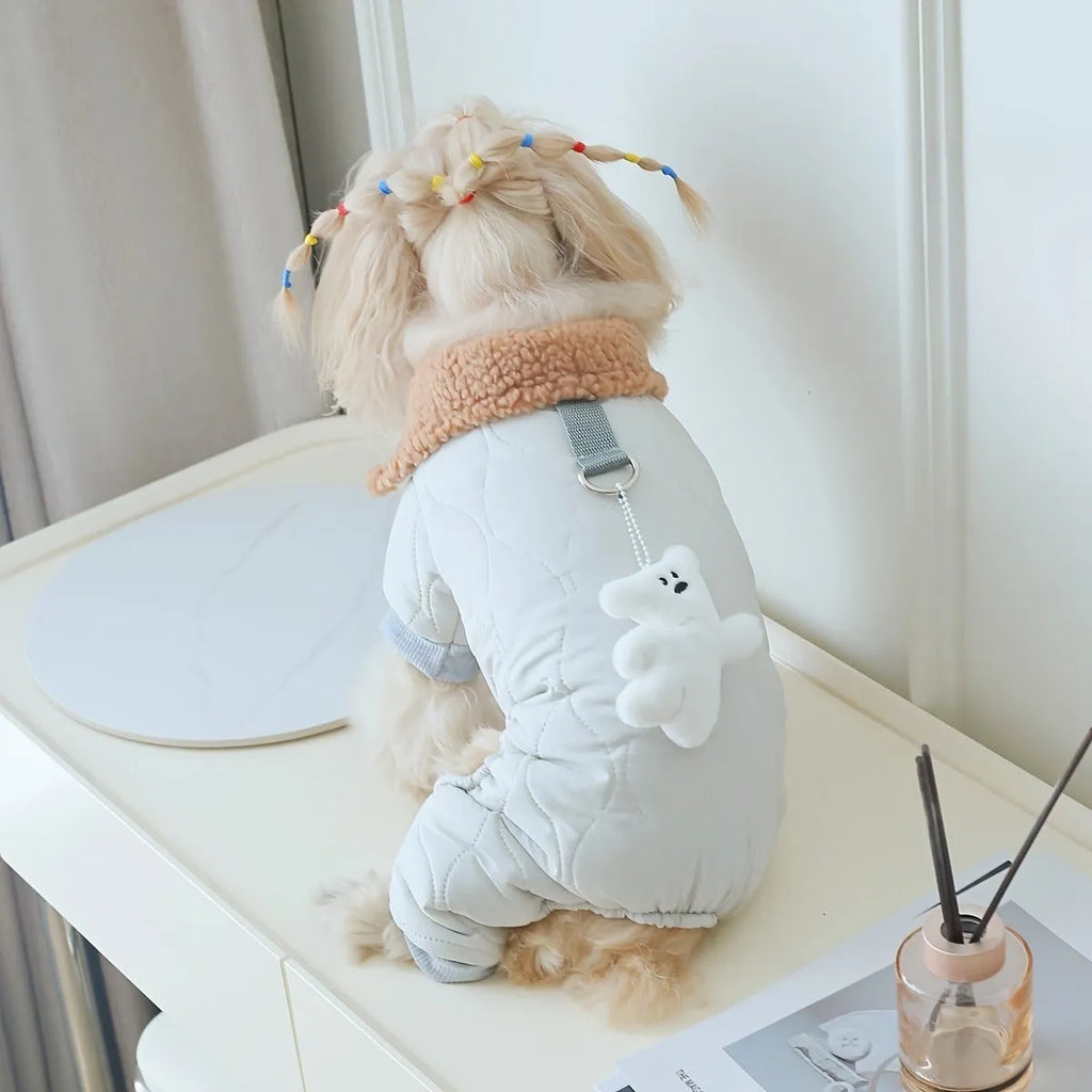 Light green cotton pet clothing with extra thick band and toy bear pendant on a dog