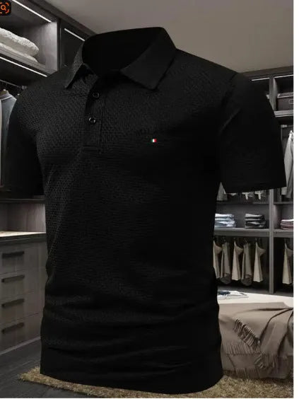 Man wearing a solid colour short-sleeved polo shirt with a formal lapel collar, loose fit.