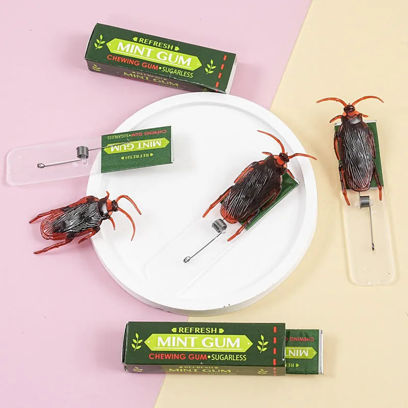 Cockroach chewing gum spoof toy in startled chewing gum colour, 9x2x1.5cm plastic PVC iron paper gag