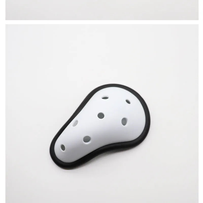 Black rubber sports genital protector for adult and child sizes used in hockey, rugby, and martial arts.