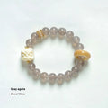 Grey agate melilite bracelet with 10mm round beads and hand-woven construction