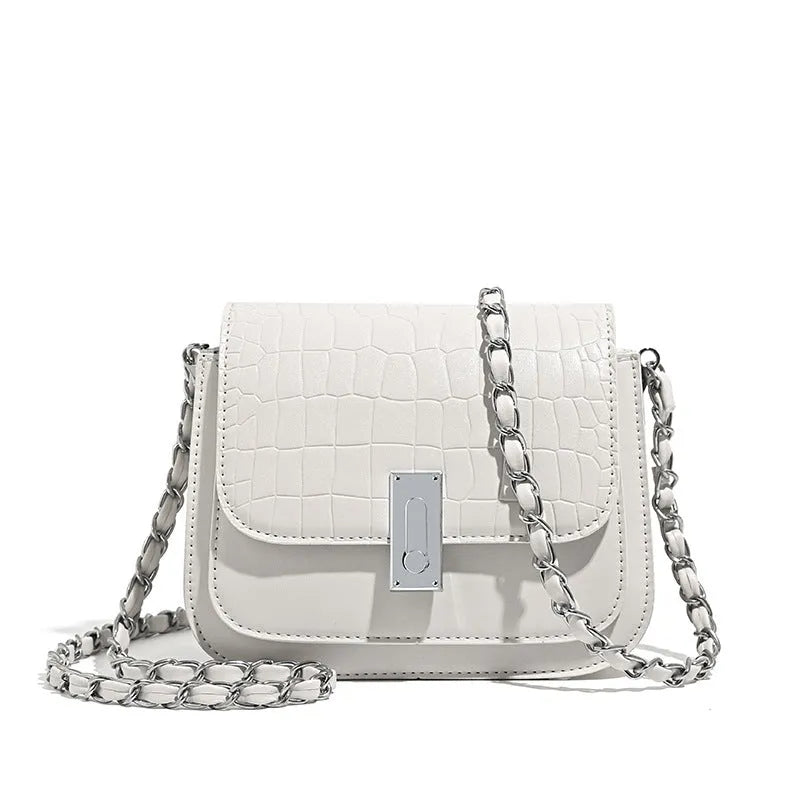 Soft black PU women's chain shoulder bag with sewing thread detail and a phone pocket.